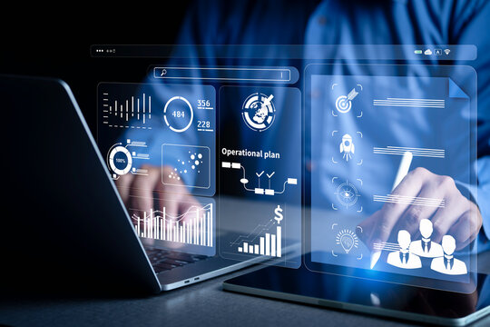 A businessman plans business using data and digital tools to set direction, goals, vision, and strategies in marketing, finance, management, and operations to achieve planned objectives.