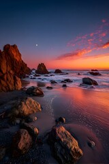 Red sunset sky, waves crashing, rocks on beach, night sky with stars.