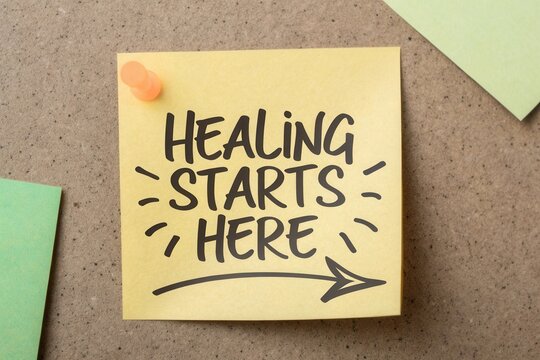 Motivational Sticky Note on Brown Corkboard Emphasizing Initiation of Healing Journey with Inspirational Message