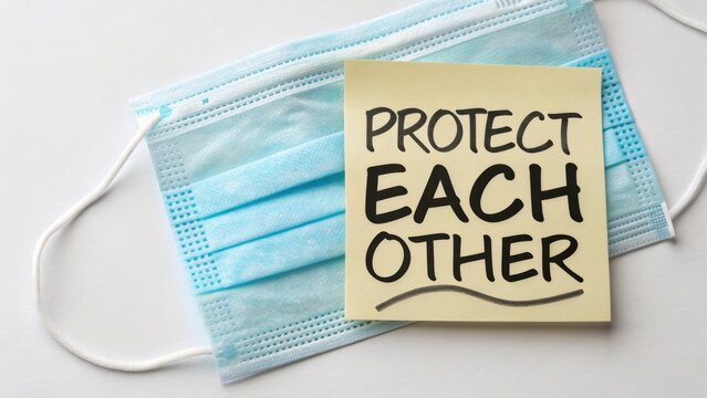 Eye-catching note on sticky paper emphasizing the importance of mutual protection during health crises alongside a face mask