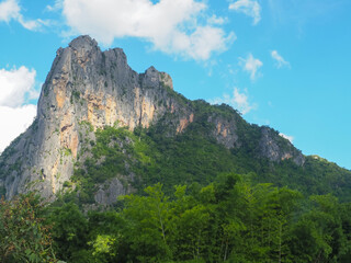Fototapeta premium View of limestone mountains in the forest during the rainy season 