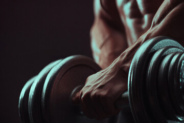 Realistic Close-Up of Muscular Arms Lifting Dumbbell in Gym