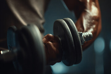 Realistic Close-Up of Muscular Arms Lifting Dumbbell in Gym