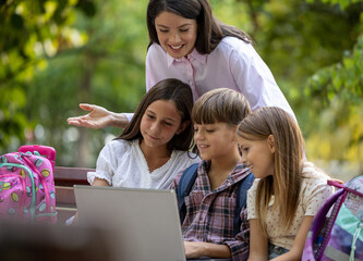 Children experiencing digital lesson in nature