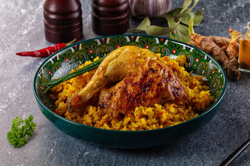 Roasted chicken leg with yellow rice