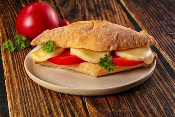 Sandwich with mozzarella and tomato