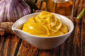 Indian yellow spicy curry sauce