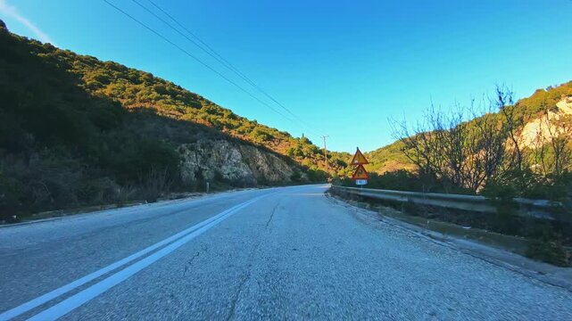 Remote scenery POV drive car travel, curvy road, Mediterranean sunny nature
