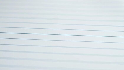 Close-up of ruled notebook paper texture, showing subtle variations in line thickness and color,  vintage,  design element