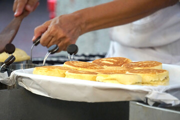 Traditional Chinese pancakes. Freshly fried buns, crispy on the outside, soft on the inside,...
