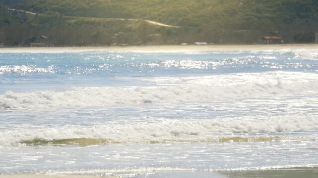 Coastal scenery Greece shore, blue water rolling waves, sunny bright day