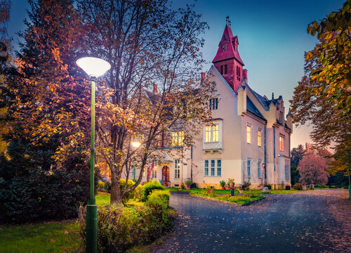 Captivating evening view of Festetics Castle - Szombathely Home for the Elderly. Impressive autumn cityscape of Szombathely town, Hungary, Europe. Colorful sunset in Hungarian countryside.