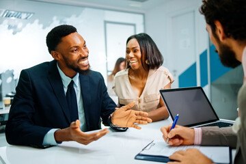 African american couple meeting financial advisor for loan application