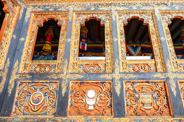 Rich decorated exterior of Tango Goemba monastery in Bhutan, Asia