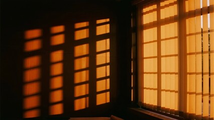 Sunlight filtering through window blinds casts warm grid patterns on a dark wall.
