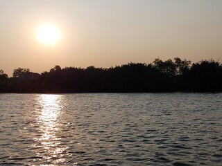 Chao Phraya River view with Bang Ka chao island background under sunset sky background