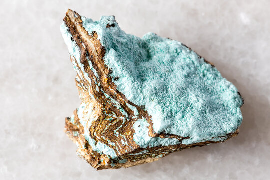 sample of rough aurichalcite mineral on white