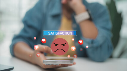 Unhappy customer giving negative feedback on smartphone. Concept of dissatisfaction, poor service...