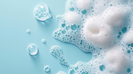 A close-up view of white soap bubbles on a light blue background, creating a clean, fresh aesthetic.