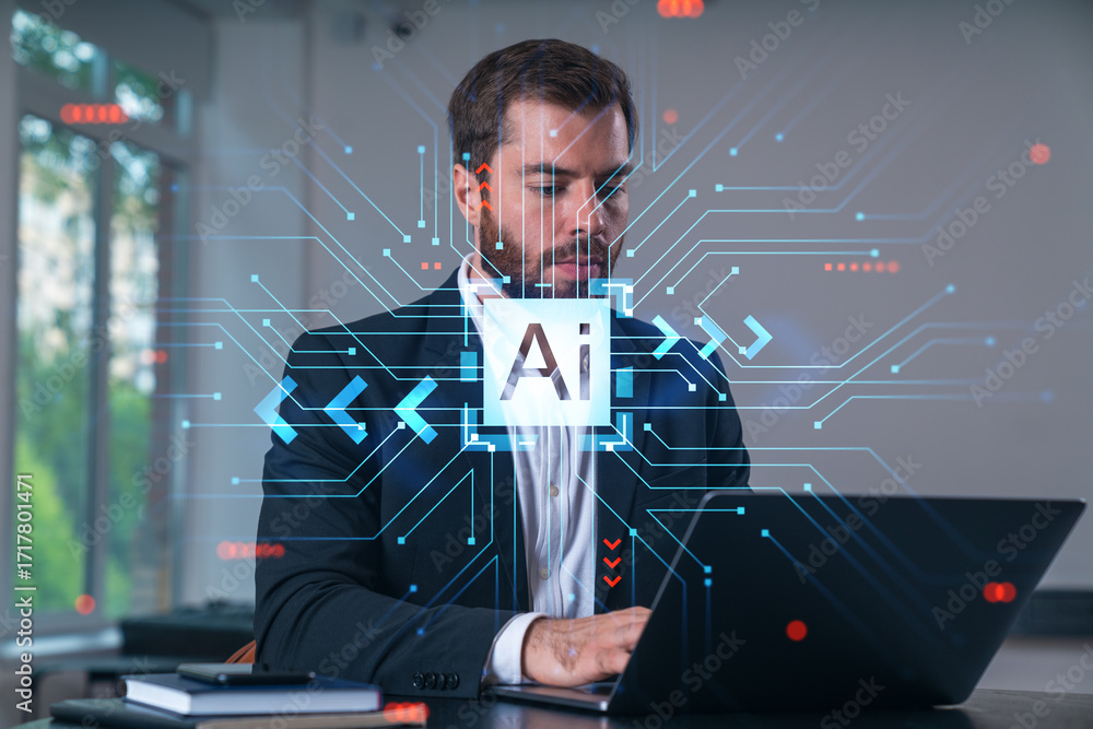 Poster man working on laptop with ai interface graphics in office environment.