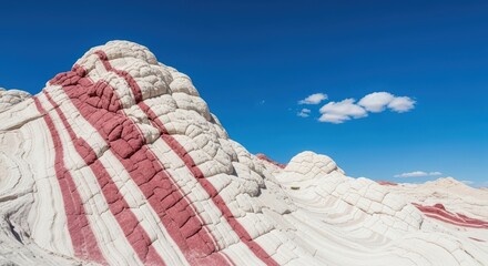 Striking Red and White Rock Formations Under a Blue Sky