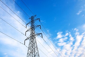 The high voltage tower with blue sky.