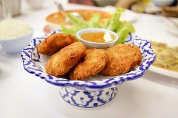 Crispy fried prawn cake with sweet sauce. 