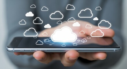 Close-up shot of a hand holding a smartphone displaying cloud icons on the screen, surrounded by a network. Concept for data storage, cloud computing solution and digital transformation