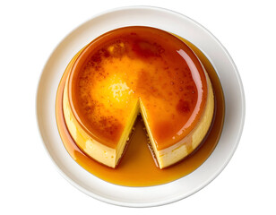 Whole caramel flan on white plate with one slice removed and syrup pooling, top view dessert on isolated background