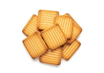 Pile of golden brown square biscuits with striped texture on white background