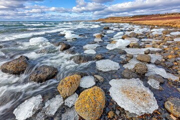 Ice-covered shoreline with turbulent water