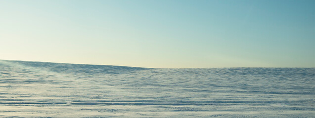 View of a snow-covered field in winter