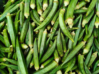 Close up shot of pile of fresh lady finger.