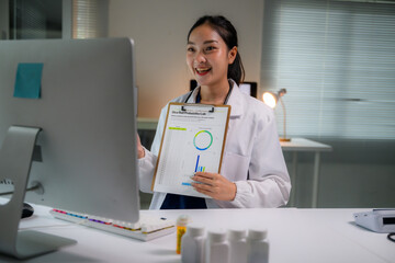 Female doctor explaining medical report during online video call, providing telemedicine...
