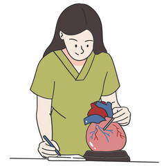 Young woman learning about anatomy of the heart