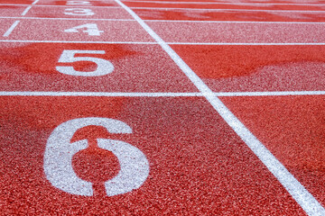 Running track with numbers in the stadium, sport background.
