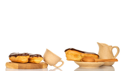Chocolate sweet eclair, macro, isolated on white  background.