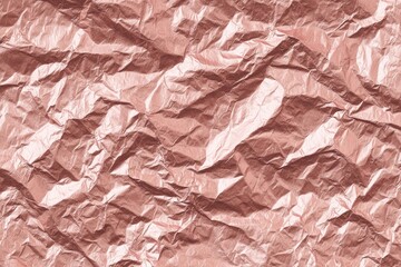 Fototapeta premium Crinkled rose gold foil texture