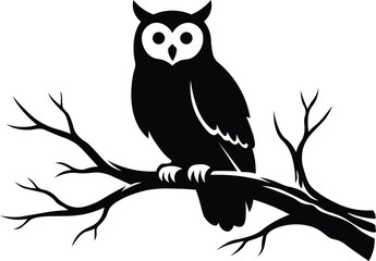 Black silhouette of an owl on a tree branch