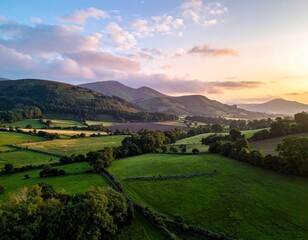 A panoramic summer landscape of green rolling hills and lush fields under a clear blue sky