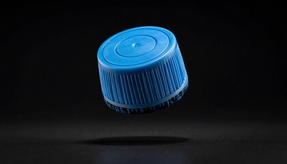 Blue plastic bottle cap, studio shot