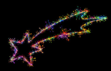 Kolorowe zimne ognie i fajerwerki układające się w kształt kolorowej Gwiazdy betlejemskiej na ciemnym tle. © Blue Pixel