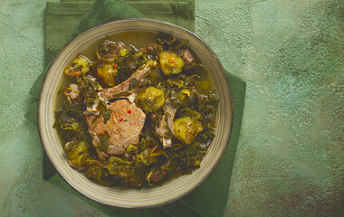 chakapuli, Georgian dish, stewed meat with herbs and tkemali, in white wine, homemade, no people,