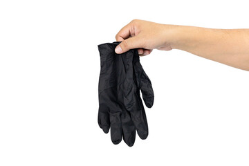 Hand holding black disposable glove isolated on white background with clipping path.