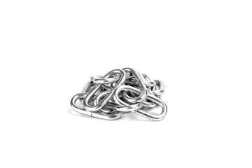 Pile of loose silver chain links isolated on white background with clipping path.