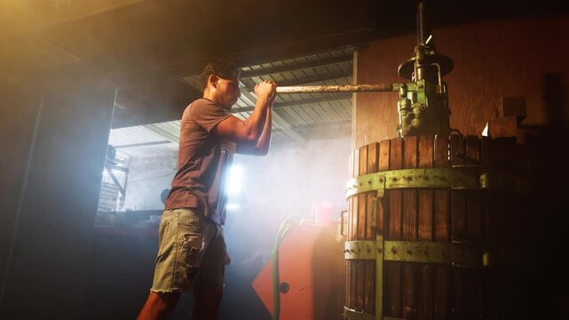 The worker uses the press