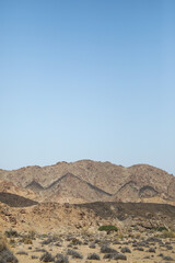 Rugged arid mountains of the Richtersveld desert area with summer storm clouds