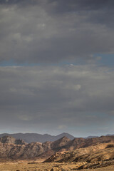 Rugged arid mountains of the Richtersveld desert area with summer storm clouds