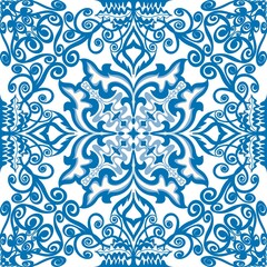 Intricate ornamental pattern in bold blue and white tones with swirling floral and geometric elements. Ideal for classic textiles, tiles, invitations, and elegant backgrounds