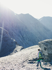 Hiker Walking on the Ridge of Mont Cenis in the French Alps – Morning Light and Mountain Adventure